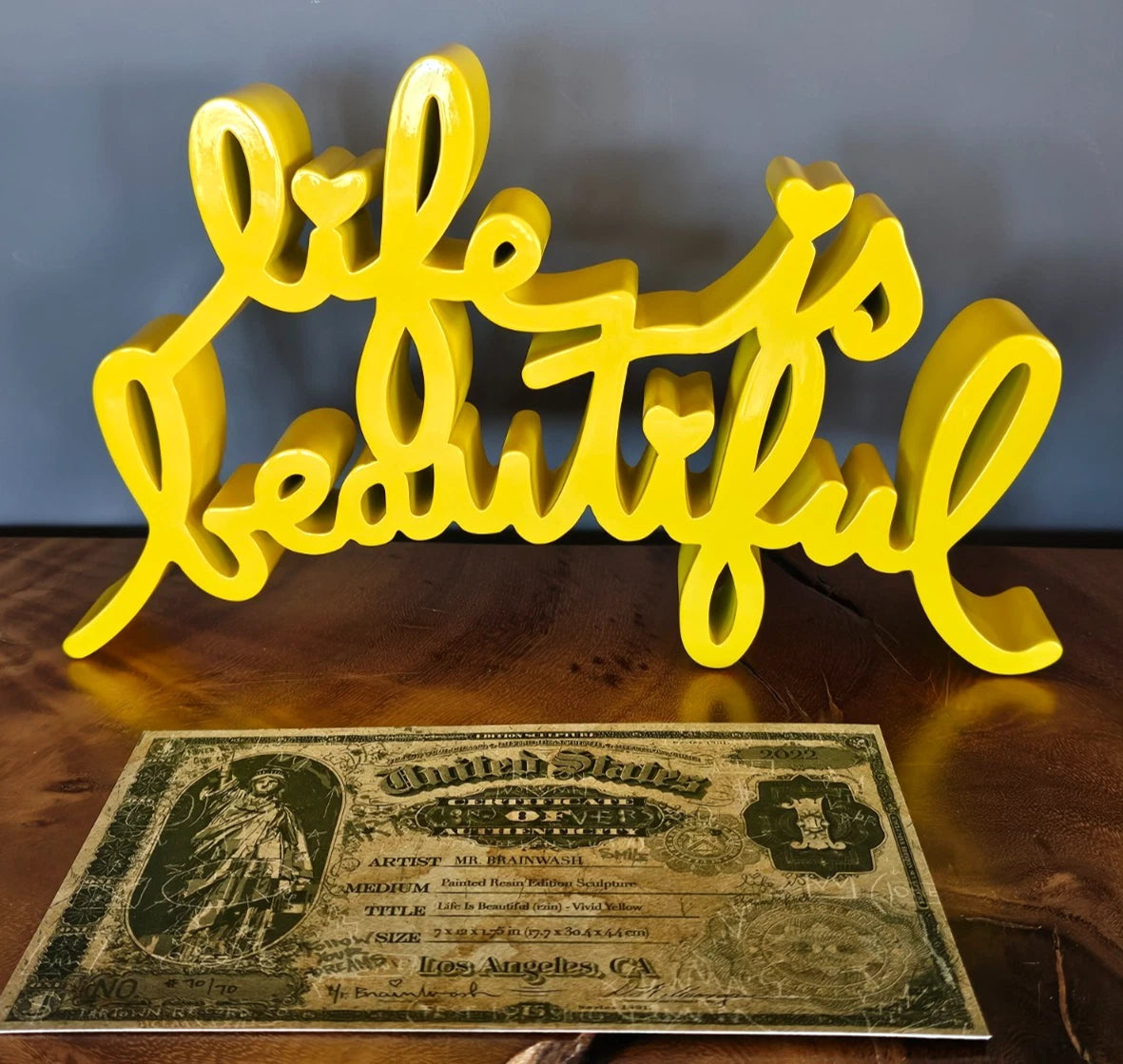 LIFE IS BEAUTIFUL SCULPTURE (YELLOW) BY MR. BRAINWASH