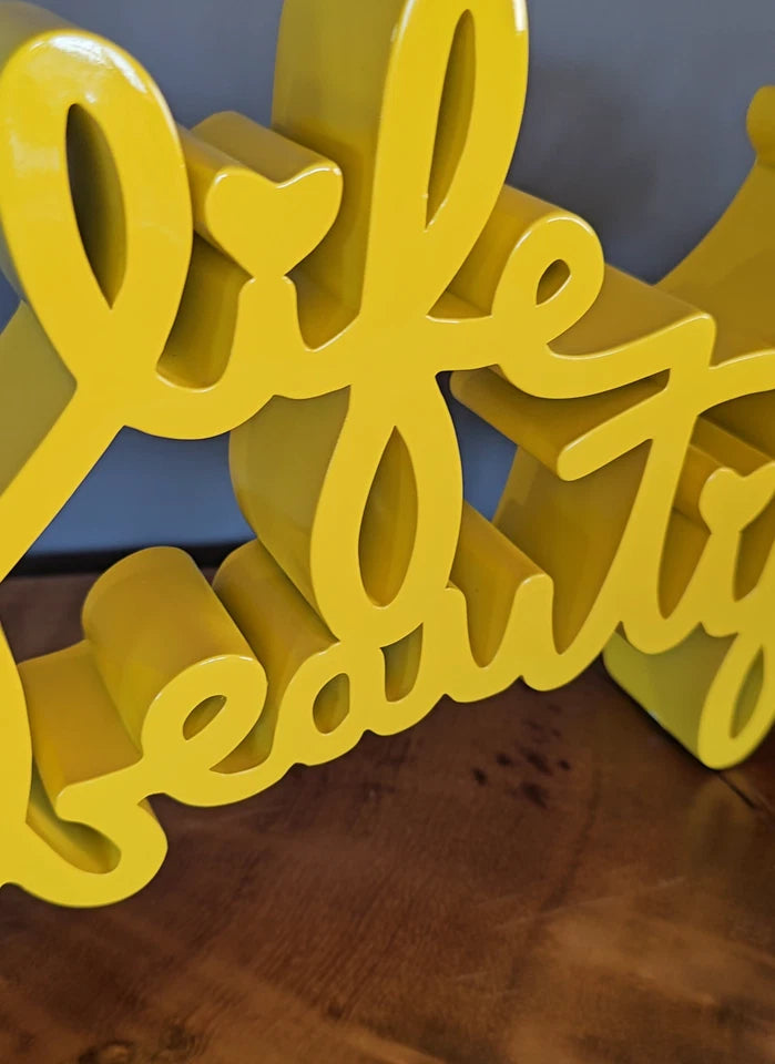 LIFE IS BEAUTIFUL SCULPTURE (YELLOW) BY MR. BRAINWASH