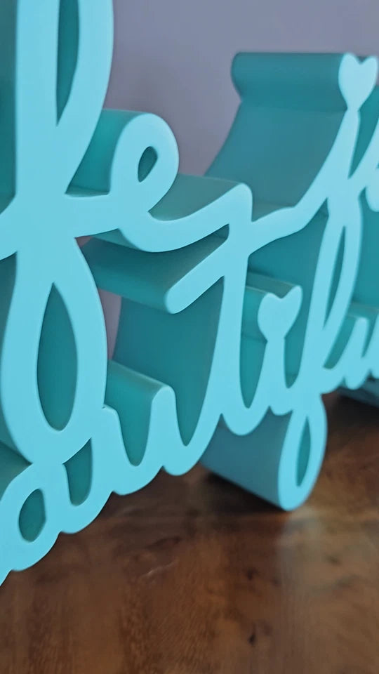 LIFE IS BEAUTIFUL SCULPTURE (MINT BLUE) BY MR. BRAINWASH